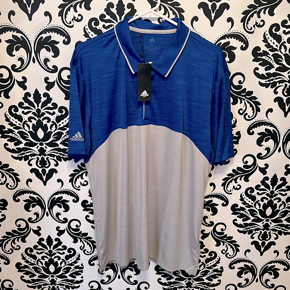New with tags, never worn. Men’s Adidas XL golf polo.